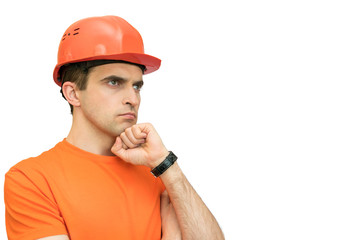 Handsome young guy with protective helmet on his head, isolated, background, copy space, for advertising