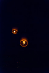 Light up lanterns flying to the sky at night