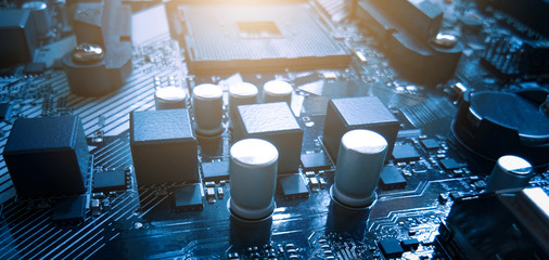 Close up of circuit mainboard background. Technology concept. Computer maintenance, repairing,...
