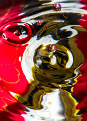 Water drops on colorful background 10