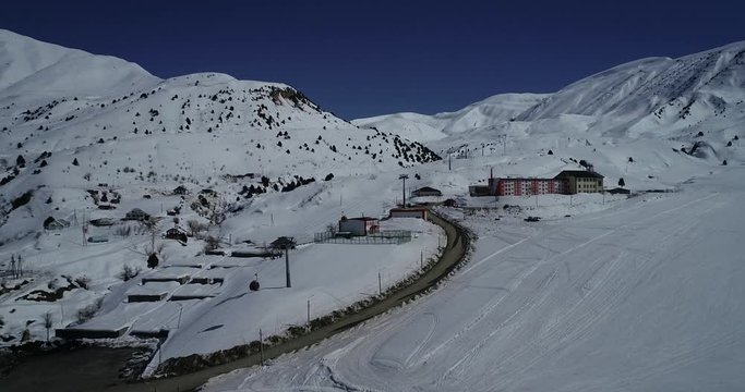 Vahdat district beautiful view from the aircraft to the mountains in Tashkent, china and Kirgistan, covered with snow. ski resort.