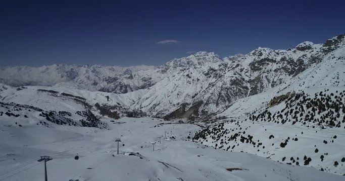 Vahdat district beautiful view from the aircraft to the mountains in Tashkent, china and Kirgistan, covered with snow. ski resort.