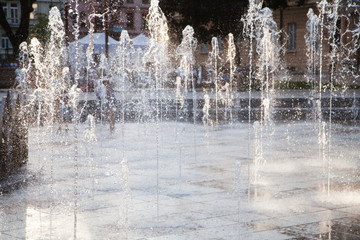 fountain in the city garden in summer