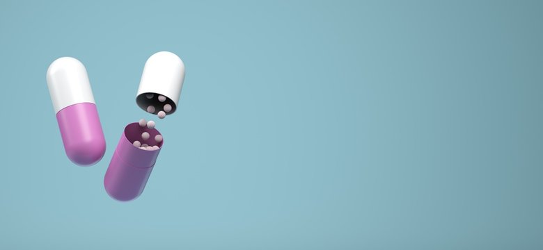 opened capsule on blue background