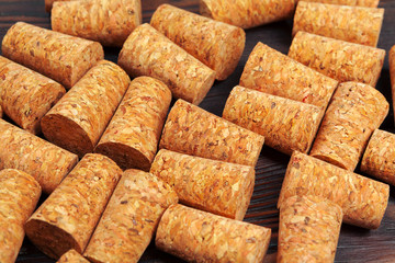Wine corks on wooden background