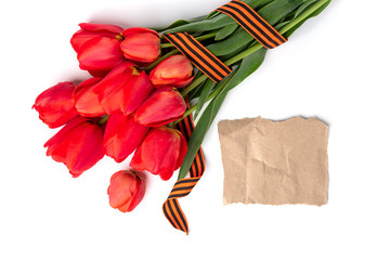 Red tulips with St. George ribbon isolated on white background. Victory day or Fatherland defender day. 