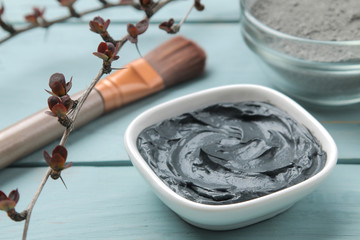 Cosmetic clay. clay facial mask on a gentle blue background. different types of clay. natural cosmetics for cosmetic procedures. Beauty concept.