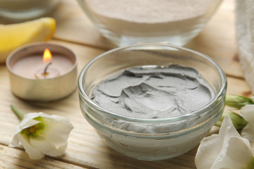 Cosmetic clay. clay mask for the face on a natural wooden background. different types of clay. natural cosmetics for cosmetic procedures. Beauty concept.