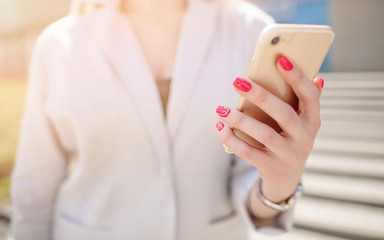 Elegant business woman in sunglasses with phone.  Business Woman with phone near office.