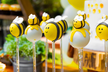 Bee themed birthday, bee shaped candies for newborn and baby shower party © ozencdeniz