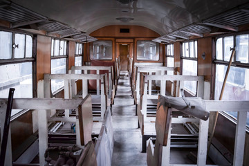 Abandoned train carriage interior stripped out