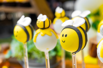 Bee themed birthday, bee shaped candies for newborn and baby shower party © ozencdeniz