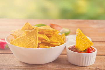 Mexican corn chips nachos with salsa dip