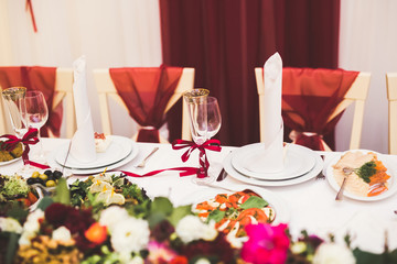 Interior of a restaurant prepared for wedding ceremony