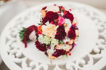 Beautiful wedding bouquet with different flowers, roses