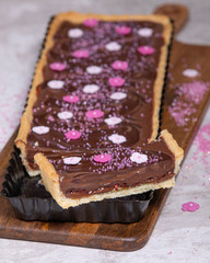 Homebaked Dark and Milk Chocolate Truffle Tart. Decorated.