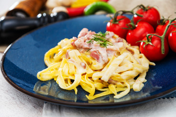 tasty Carbonara pasta on the table
