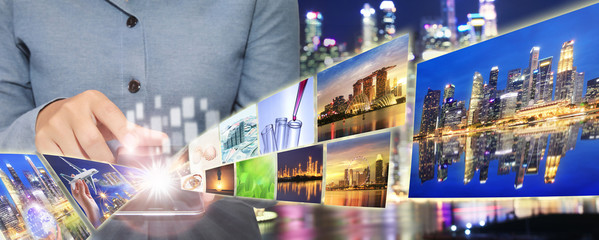 Hand using smart phone mobile in city technology concept