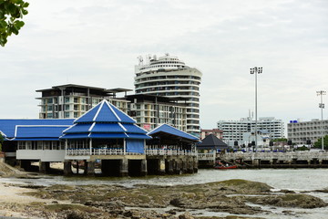 Obraz premium The sea view on a bright day, viewed from the local fishing port that is visible