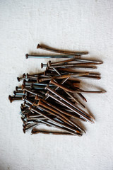 nails on wooden background