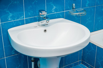 The photo of a sink in a bathroom