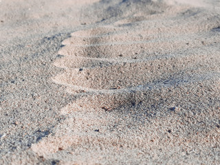 Sand on the beach with little depth of field. Picture taken on the beach of Benidorm, Spain