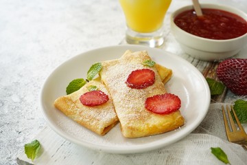 Homemade sweet Crepes with ricotta filling / Thin pancakes with cheese stuffing