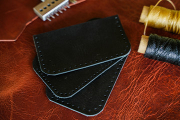 Leather craftsmanshiip with handmade tool object
