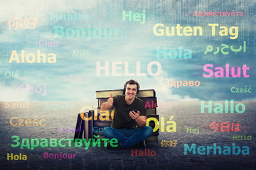 student guy learn different languages on earphones