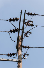 Electric pole for distribution to the village.