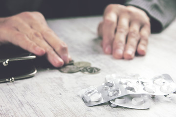 Hands of old woman, counting money