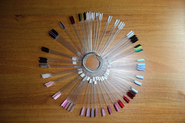 palette of varnishes in different colors and shades