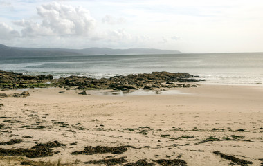 Sand beach  in the north of Spain in a cloudy day.