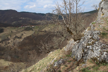 Fototapeta premium Panoramic view from the ruins of an ancient stone Klek fortress on the hill near Zlatar mountain, Serbia