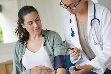 Pregnant woman at doctor's office
