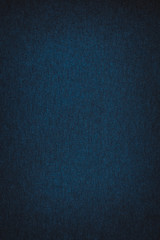 dark blue background. abstract texture of fleecy knitted fabric.