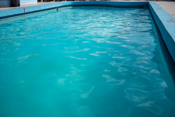 Inviting blue pool with ripples on the surface