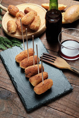Chicken croquettes punctured with toothpick