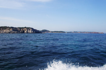 Fototapeta premium View from the sea to the shore and cliffs.