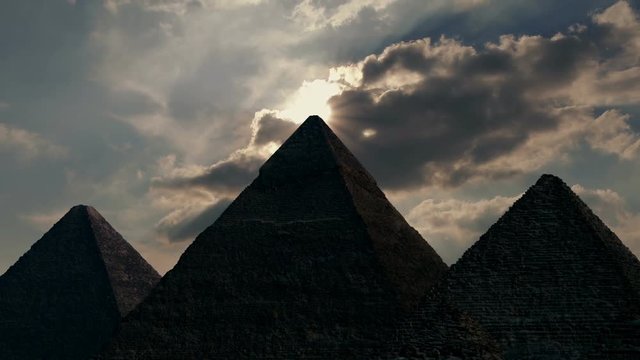 Sun Appears Over Ancient Pyramids
