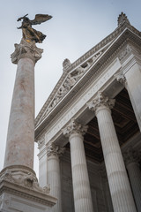 Fototapeta na wymiar Column and statue at the entrance of the Vittorio Emanuele II monument in Rome