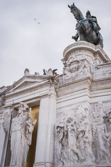 Fototapeta na wymiar Details of the Monument to Vittorio Emanuele II with the Italian flag in Rome