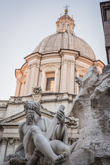 Fototapeta na wymiar Statue and building of Piazza Navona in Rome