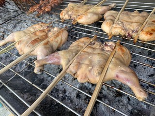 Close up of Grilled chicken on the stove