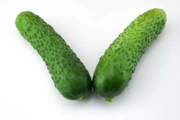 Two green cucumbers
