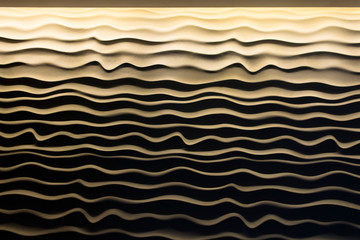 wavy texture of the wall with a hard light in dark colours