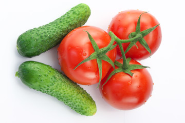 Three red ripe tomatoes