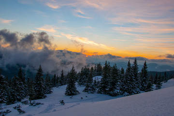 Amazing landscape in the winter mountains at sunrise
