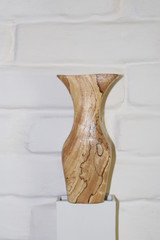 Wooden vase in a rustic style