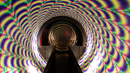 the dizzy tunnel is spinning in the hold time capsule or transportation concept machine